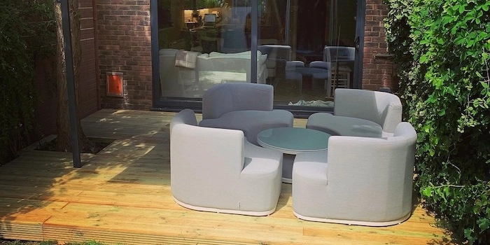 slider image of a garden before work to showcase handcoded slider